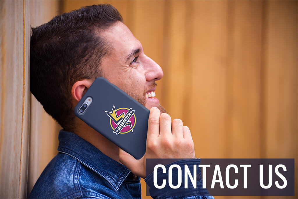 A smiling man contacting Dubsnatch by phone