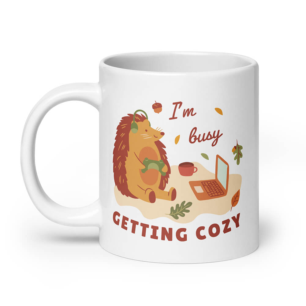 https://dubsnatch.com/cdn/shop/files/busy-cozy-pc-player-hedgehog-mug-coffee-mug-20oz-dubsnatch_1200x.jpg?v=1696265446